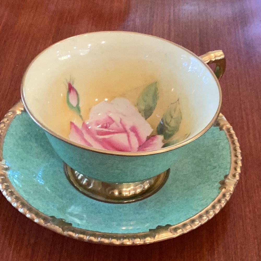 Paragon English fine bone china. Green with rose motif.